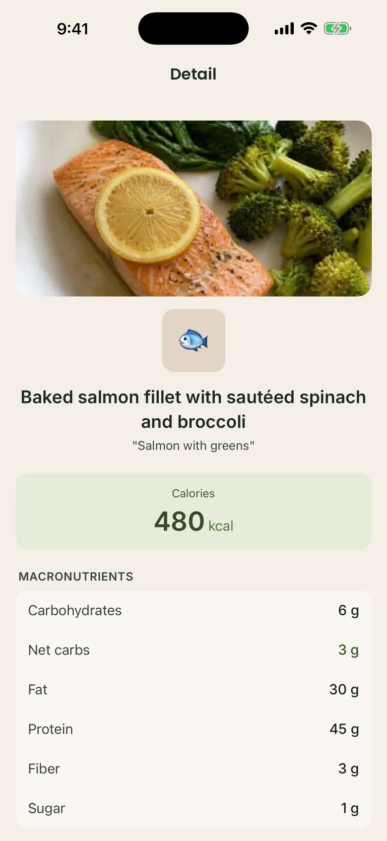 A salmon dinner logged from a photo, with calories, net carbs, and macros